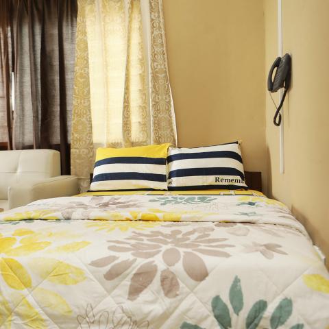Normal room: bed and bedside phone